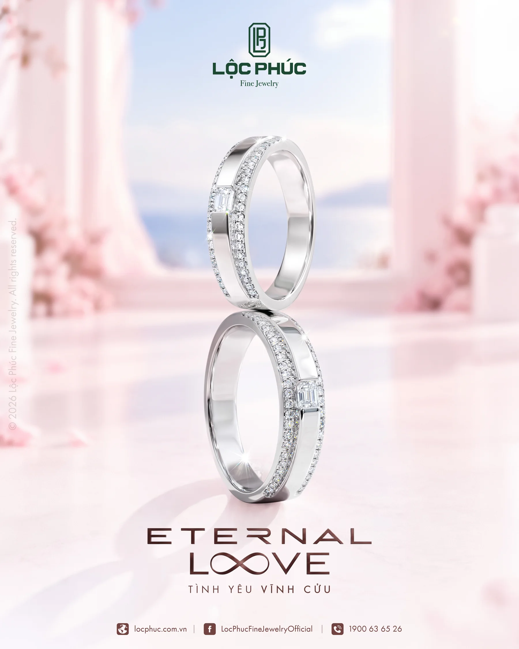 Hình concept nhẫn cưới Eternal Love của Lộc Phúc, cặp nhẫn vô cực trên nền hồng phấn và hoa anh đào