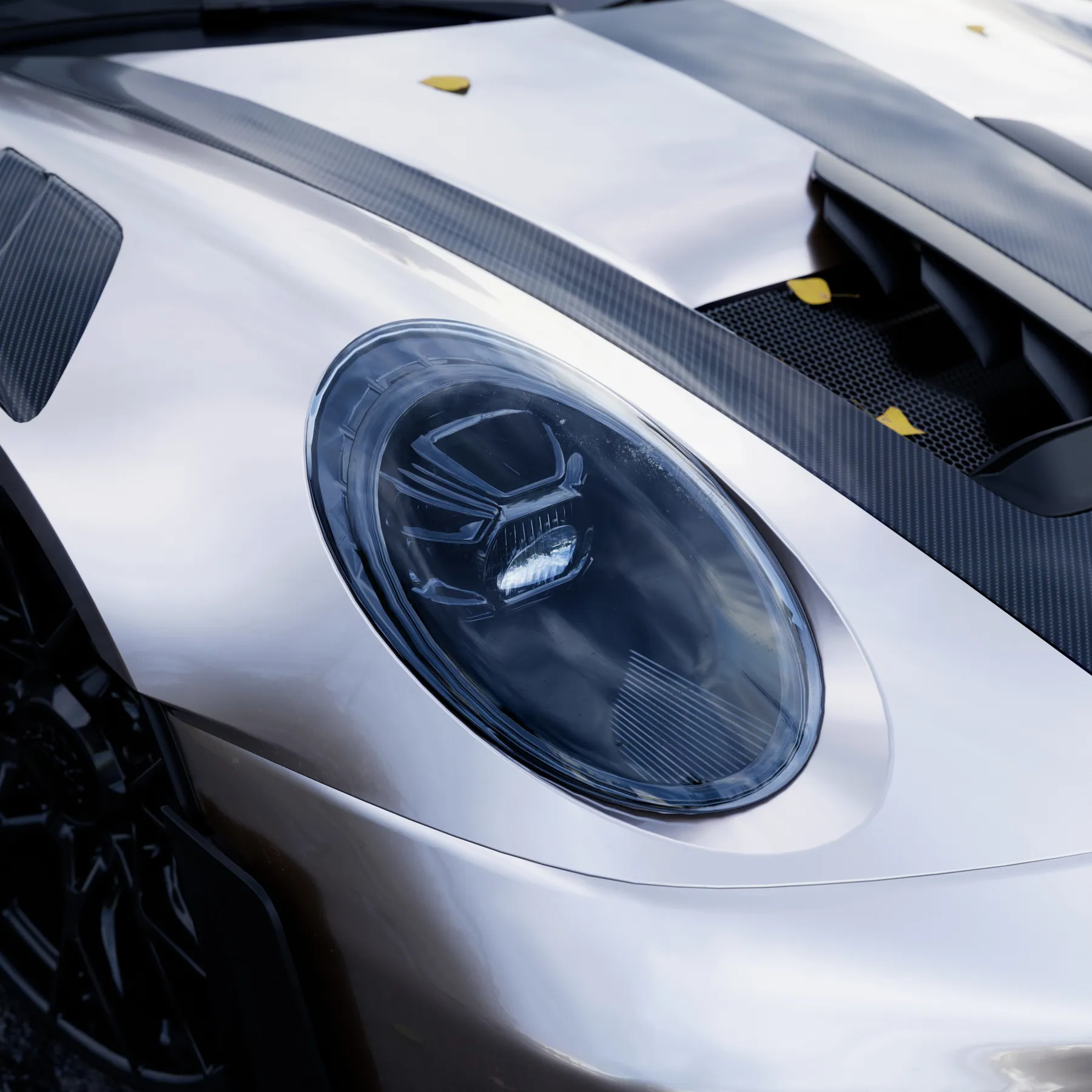 Cận cảnh đèn trước Porsche 911 và nắp ca-pô carbon