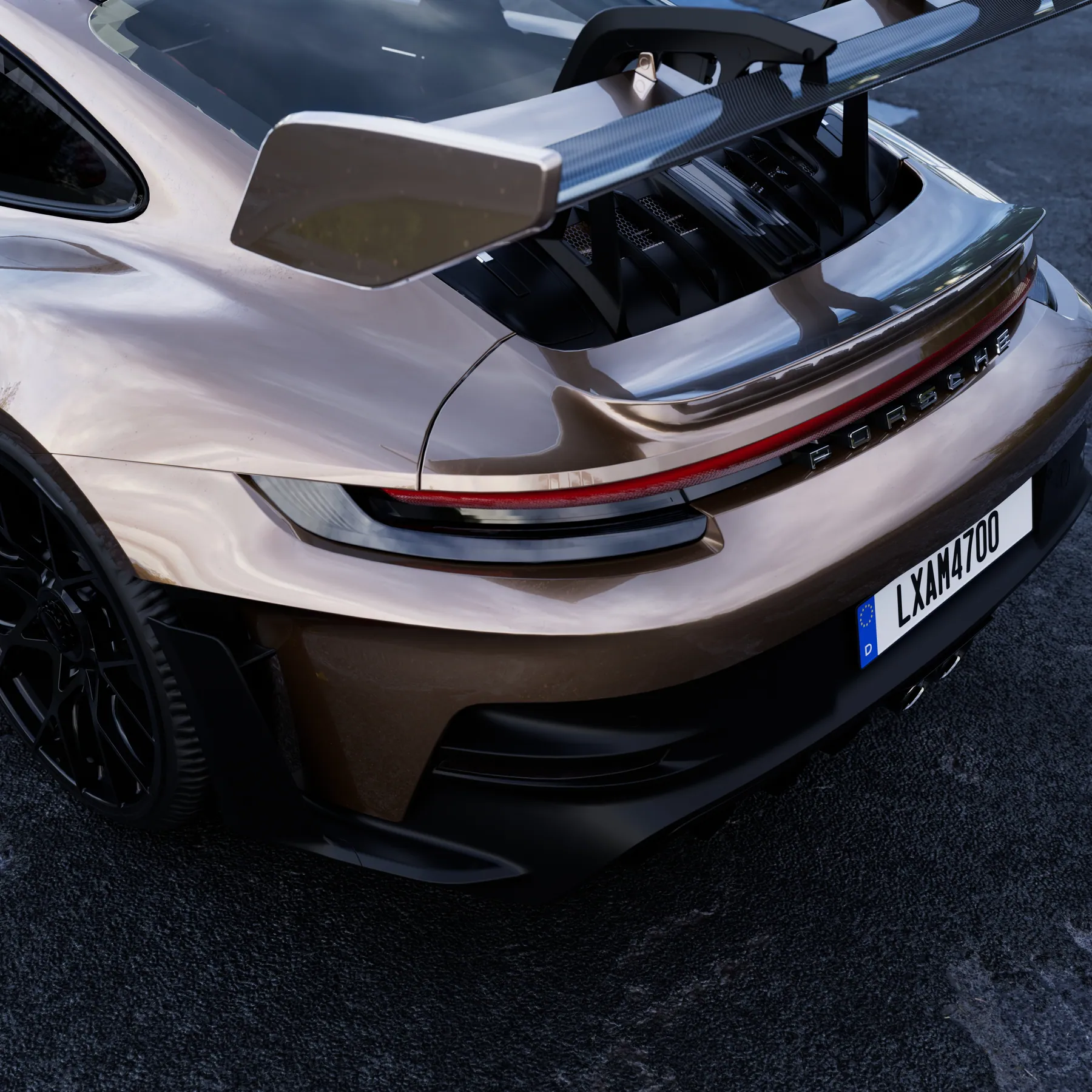 Porsche 911 nhìn từ góc cao phía sau, thấy rõ cánh gió