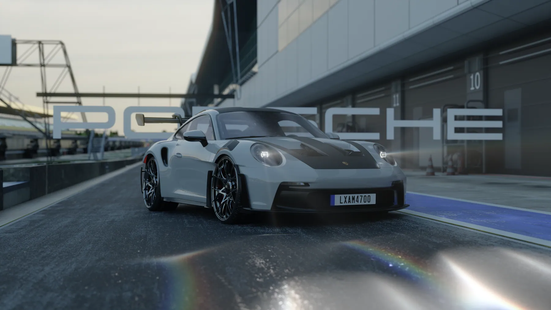 Porsche 911 đứng trong pit lane trường đua, render bằng Blender