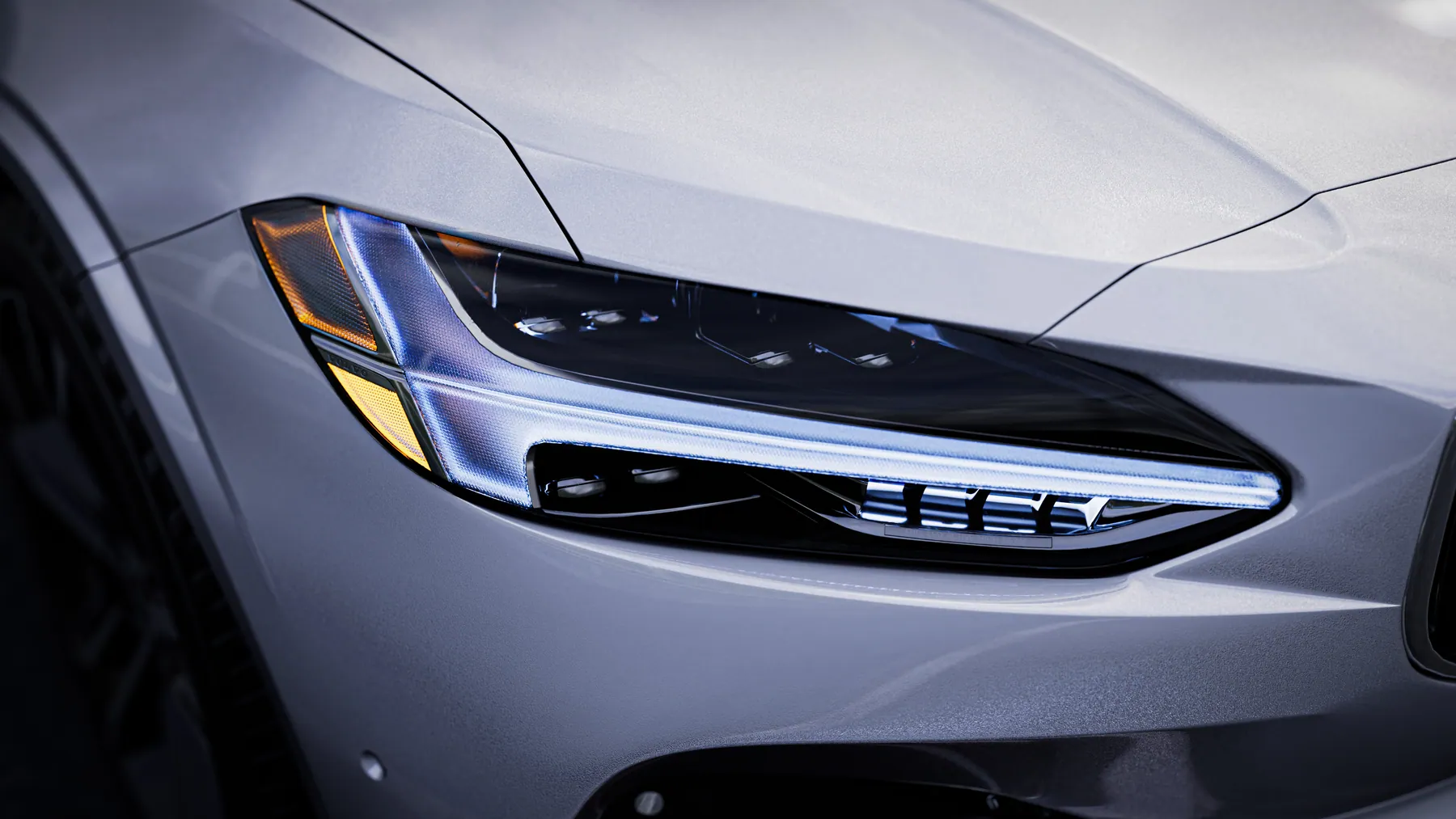 Volvo S90 chạy dưới cầu vượt với bầu trời nhiều mây